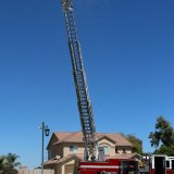 A bunch of kids and probably a few adults got a rainshower courtesy of the Lemoore Volunteer Fire Department and its ladder truck.